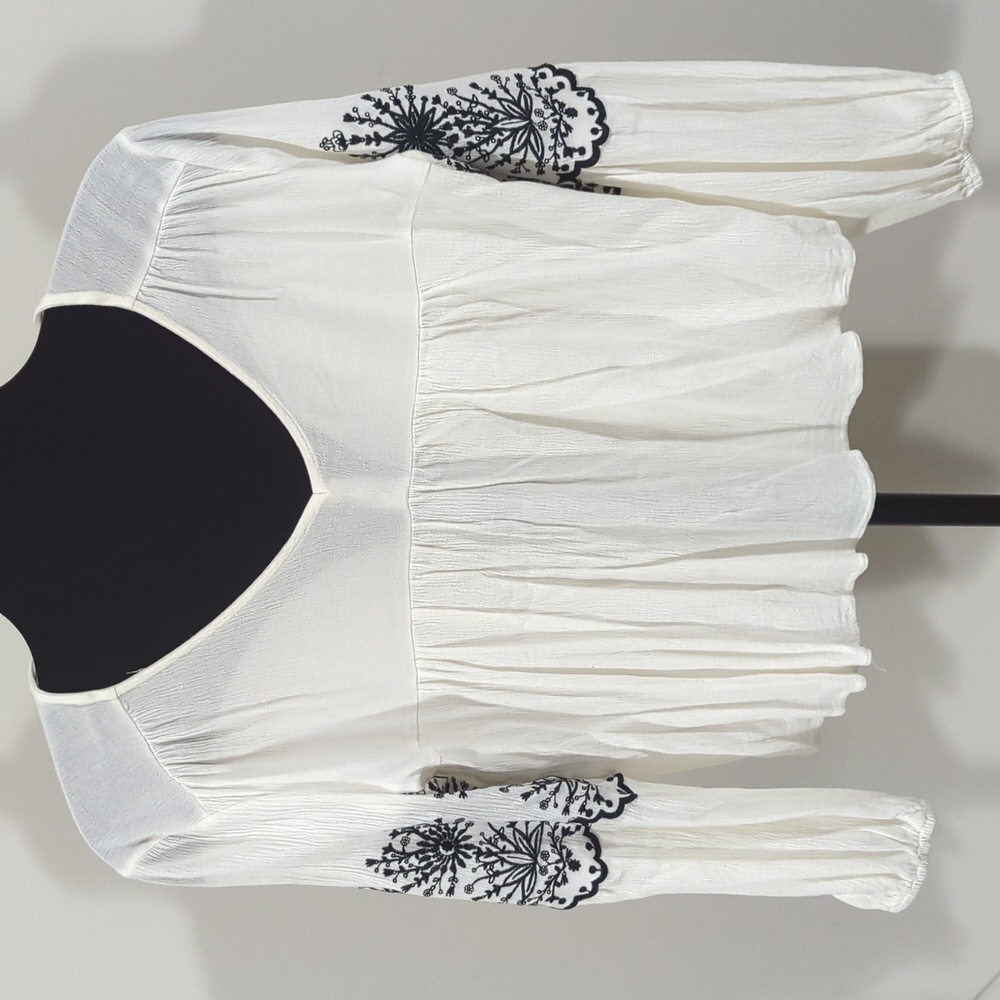 Off-White Blouse with Black Details